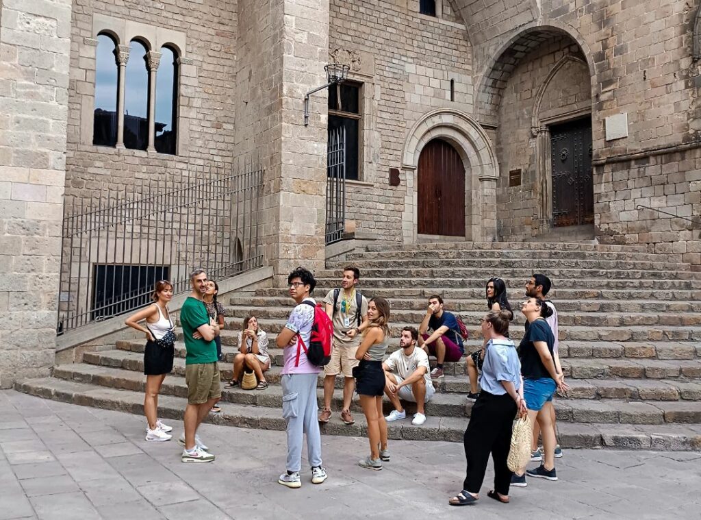 People gathering for a free walking tour in Barcelona Gothic Quarter
